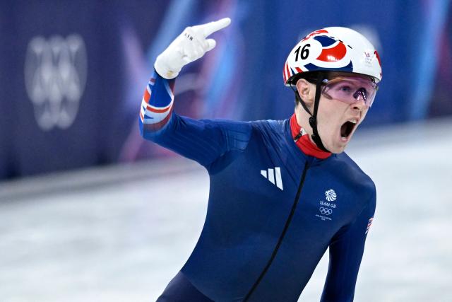 Britain's Niall Treacy reacts after competing in the short track speed skating men's 1500m semi-final during the Milano Cortina 2026 Winter Olympic Games at Milano Ice Skating Arena in Milan on February 14, 2026. (Photo by WANG Zhao / AFP)
