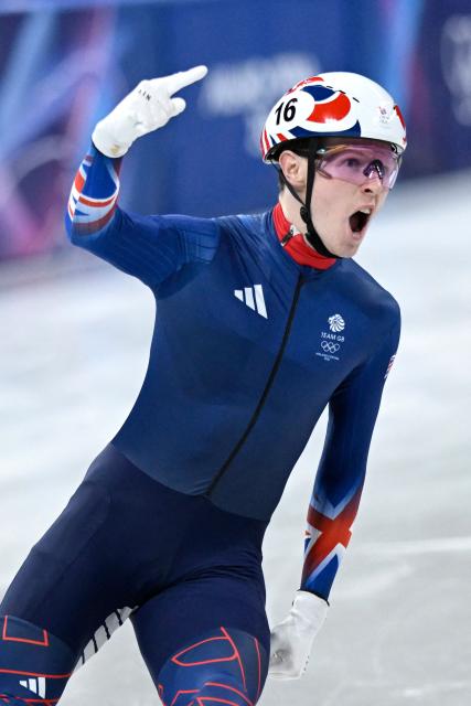 Britain's Niall Treacy reacts after competing in the short track speed skating men's 1500m semi-final during the Milano Cortina 2026 Winter Olympic Games at Milano Ice Skating Arena in Milan on February 14, 2026. (Photo by WANG Zhao / AFP)