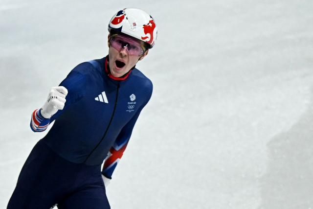 Britain's Niall Treacy reacts after competing in the short track speed skating men's 1500m semi-final during the Milano Cortina 2026 Winter Olympic Games at Milano Ice Skating Arena in Milan on February 14, 2026. (Photo by Gabriel BOUYS / AFP)