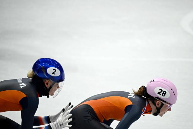 Netherlands' Xandra Velzeboer (L) and Netherlands' Zoe Florence Deltrap compete in the short track speed skating women's 3000m relay semi-final during the Milano Cortina 2026 Winter Olympic Games at Milano Ice Skating Arena in Milan on February 14, 2026. (Photo by Gabriel BOUYS / AFP)