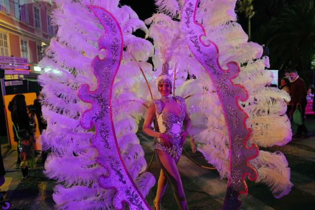An artist performs during the opening parade of the 141th edition of the Nice Carnival in the French Riviera City of Nice on February 14, 2026. (Photo by Valery HACHE / AFP)