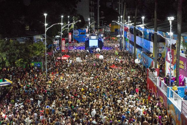 BaianaSystem carnival group parade in Salvador, Bahia, Brazil on February 14, 2026. BaianaSystem revolutionized Bahian music by blending the traditional Bahian guitar with the aesthetics of Jamaican sound systems, Afro-Brazilian rhythms (afoxé, ijexá, samba-reggae), and electronic music. (Photo by Antonello Veneri / AFP)