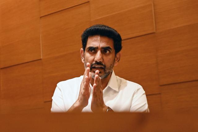 This photograph taken on January 4, 2026 shows information technology minister for India's Andhra Pradesh state Nara Lokesh speaking during an interview with AFP in New Delhi. As India races to narrow the artificial intelligence gap with the United States and China, it is planning a vast new "data city" to power digital growth on a staggering scale, the man spearheading the project says. (Photo by Arun SANKAR / AFP) / To go with 'India-Economy-Technology-AI'