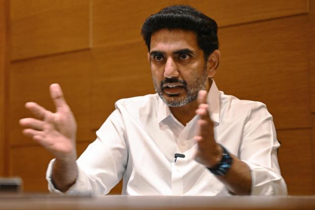 This photograph taken on January 4, 2026 shows information technology minister for India's Andhra Pradesh state Nara Lokesh speaking during an interview with AFP in New Delhi. As India races to narrow the artificial intelligence gap with the United States and China, it is planning a vast new "data city" to power digital growth on a staggering scale, the man spearheading the project says. (Photo by Arun SANKAR / AFP) / To go with 'India-Economy-Technology-AI'
