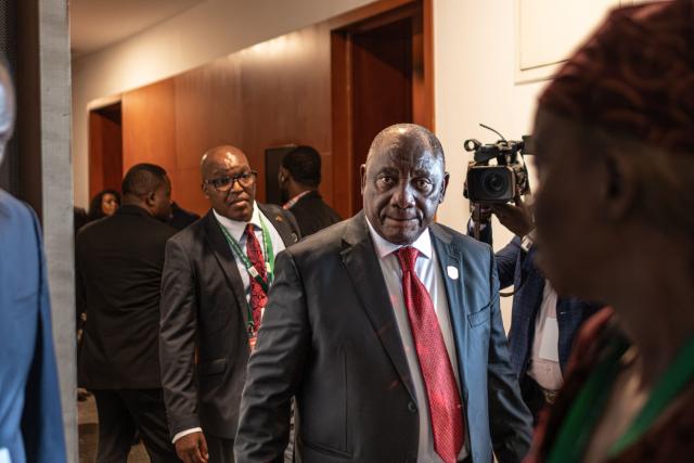 Cyril Ramaphosa, President of the Republic of South Africa, leaves a bilateral meeting during the 39th Ordinary Session of the Assembly of the African Union at the AU Headquarters in Addis Ababa on February 15, 2026. (Photo by Marco Simoncelli / AFP)