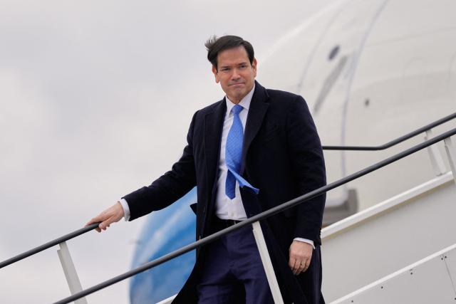 US Secretary of State Marco Rubio disembarks his plane after landing at the Bratislava Airport in Bratislava, Slovakia, on February 15, 2026. (Photo by Alex Brandon / POOL / AFP)