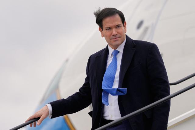 US Secretary of State Marco Rubio disembarks his plane after landing at the Bratislava Airport in Bratislava, Slovakia, on February 15, 2026. (Photo by Alex Brandon / POOL / AFP)