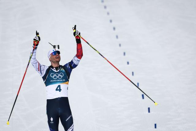 France's Emilien Jacquelin reacts while crossing the finish line during the men's biathlon 12,5km pursuit event during the Milano Cortina 2026 Winter Olympic Games at the Anterselva Biathlon Arena (Sudtirol Arena) in Anterselva (Val Pusteria) on February 15, 2026. (Photo by FRANCK FIFE / AFP)