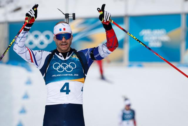 France's Emilien Jacquelin reacts after crossing the finish line during the men's biathlon 12,5km pursuit event during the Milano Cortina 2026 Winter Olympic Games at the Anterselva Biathlon Arena (Sudtirol Arena) in Anterselva (Val Pusteria) on February 15, 2026. (Photo by Odd ANDERSEN / AFP)