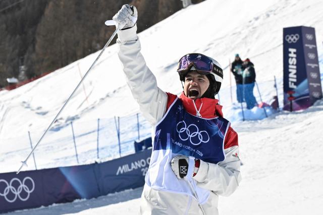 Canada's Mikael Kingsbury reacts in the freestyle skiing men's dual moguls final during the Milano Cortina 2026 Winter Olympic Games at Livigno Aerials & Moguls Park, in Livigno (Valtellina), on February 15, 2026. (Photo by Jeff PACHOUD / AFP)