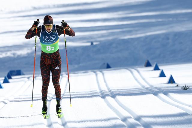 Germany's Friedrich Moch competes during the cross-country men's 4 x 7,5km relay event of the Milano Cortina 2026 Winter Olympic Games at Tesero Cross-Country Skiing Stadium in Lago di Tesero (Val di Fiemme), on February 15, 2026. (Photo by Anne-Christine POUJOULAT / AFP)