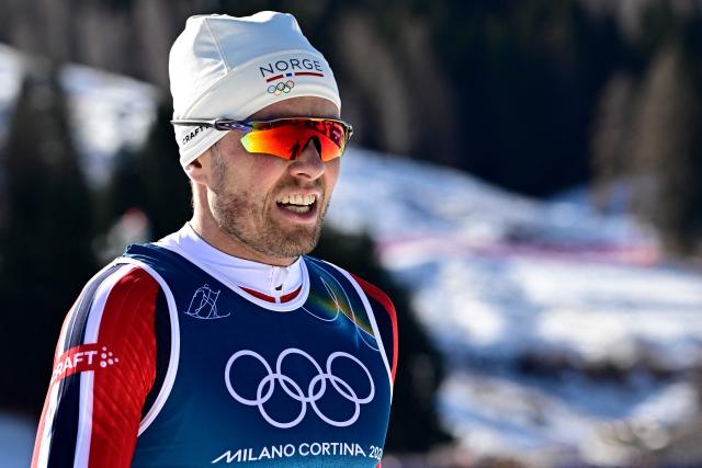 Norway's Emil Iversen reacts after competing during the cross-country men's 4 x 7,5km relay event of the Milano Cortina 2026 Winter Olympic Games at Tesero Cross-Country Skiing Stadium in Lago di Tesero (Val di Fiemme), on February 15, 2026. (Photo by Tobias SCHWARZ / AFP)