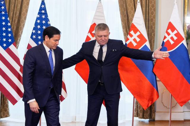 US Secretary of State Marco Rubio (L) meets with Slovakia's Prime Minister Robert Fico in Bratislava, Slovakia, on February 15, 2026. (Photo by Alex Brandon / POOL / AFP)