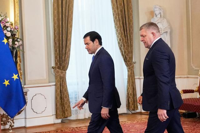 US Secretary of State Marco Rubio (L) meets with Slovakia's Prime Minister Robert Fico in Bratislava, Slovakia, on February 15, 2026. (Photo by Alex Brandon / POOL / AFP)