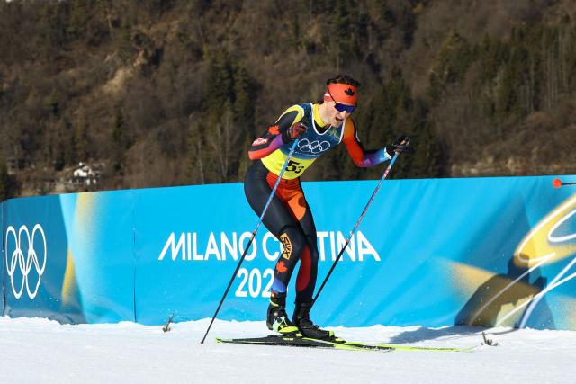 Canada's Remi Drolet competes during the cross-country men's 4 x 7,5km relay event of the Milano Cortina 2026 Winter Olympic Games at Tesero Cross-Country Skiing Stadium in Lago di Tesero (Val di Fiemme), on February 15, 2026. (Photo by Anne-Christine POUJOULAT / AFP)