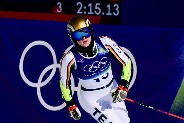 Germany's Emma Aicher reacts in the finish area after competing in the second run of the women's giant slalom event during the Milano Cortina 2026 Winter Olympic Games at the Tofane Alpine Skiing Centre in Cortina d’Ampezzo on February 15, 2026. (Photo by Stefano RELLANDINI / AFP)