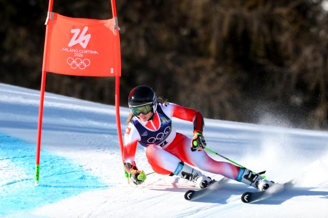 Switzerland's Camille Rast competes in  the second run of the women's giant slalom event during the Milano Cortina 2026 Winter Olympic Games at the Tofane Alpine Skiing Centre in Cortina d’Ampezzo on February 15, 2026. (Photo by Marco BERTORELLO / AFP)