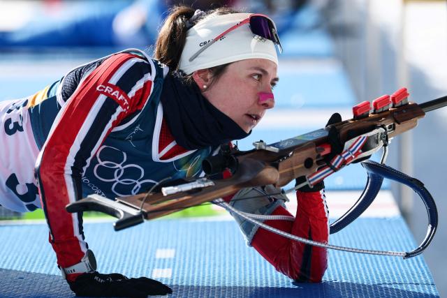 Norway's Marthe Krakstad Johansen warms up in the shooting range ahead of the women's biathlon 10km pursuit event during the Milano Cortina 2026 Winter Olympic Games at the Anterselva Biathlon Arena (Sudtirol Arena) in Anterselva (Val Pusteria) on February 15, 2026. (Photo by FRANCK FIFE / AFP)