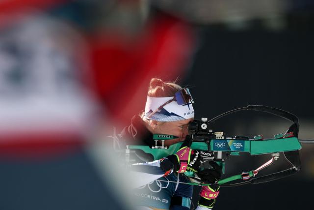 Finland's Suvi Minkkinen warms up in the shooting range ahead of the women's biathlon 10km pursuit event during the Milano Cortina 2026 Winter Olympic Games at the Anterselva Biathlon Arena (Sudtirol Arena) in Anterselva (Val Pusteria) on February 15, 2026. (Photo by FRANCK FIFE / AFP)