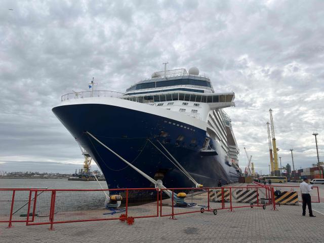The Celebrity Equinox cruise ship remains moored at the port of Montevideo on February 15, 2026. (Photo by Ivanna INFANTOZZI / AFP)