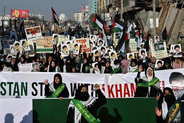 Shiite Muslims shout slogans during a protest rally in Karachi on February 15, 2026, condemning the suicide blast at a mosque in Islamabad. February 6 attack, which was claimed by the Islamic State group, was the deadliest in Islamabad since the 2008 Marriott hotel bombing. (Photo by Asif HASSAN / AFP)