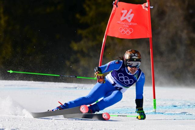 Italy's Federica Brignone competes in the second run of the women's giant slalom event during the Milano Cortina 2026 Winter Olympic Games at the Tofane Alpine Skiing Centre in Cortina d’Ampezzo on February 15, 2026. (Photo by Stefano RELLANDINI / AFP)