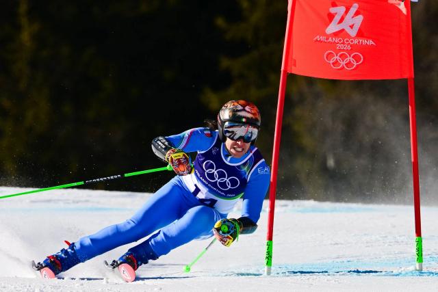 Italy's Federica Brignone competes in the second run of the women's giant slalom event during the Milano Cortina 2026 Winter Olympic Games at the Tofane Alpine Skiing Centre in Cortina d’Ampezzo on February 15, 2026. (Photo by Stefano RELLANDINI / AFP)