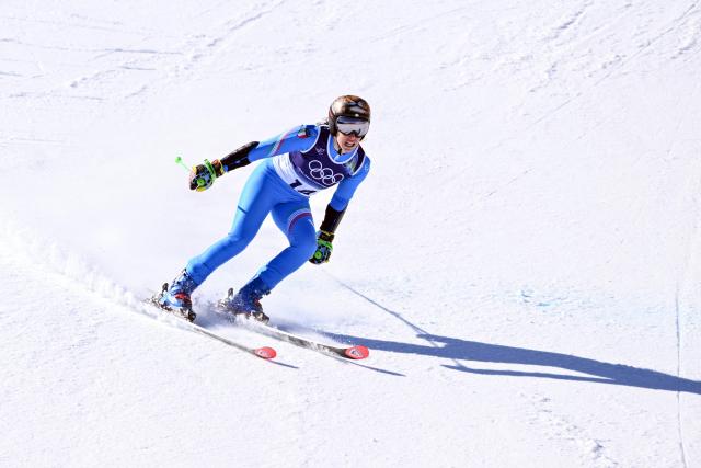Italy's Federica Brignone reacts in the finish area after winning  the women's giant slalom event during the Milano Cortina 2026 Winter Olympic Games at the Tofane Alpine Skiing Centre in Cortina d’Ampezzo on February 15, 2026. (Photo by Tiziana FABI / AFP)