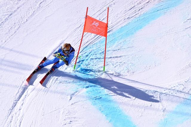 Italy's Federica Brignone competes in the second run of the women's giant slalom event during the Milano Cortina 2026 Winter Olympic Games at the Tofane Alpine Skiing Centre in Cortina d’Ampezzo on February 15, 2026. (Photo by Tiziana FABI / AFP)