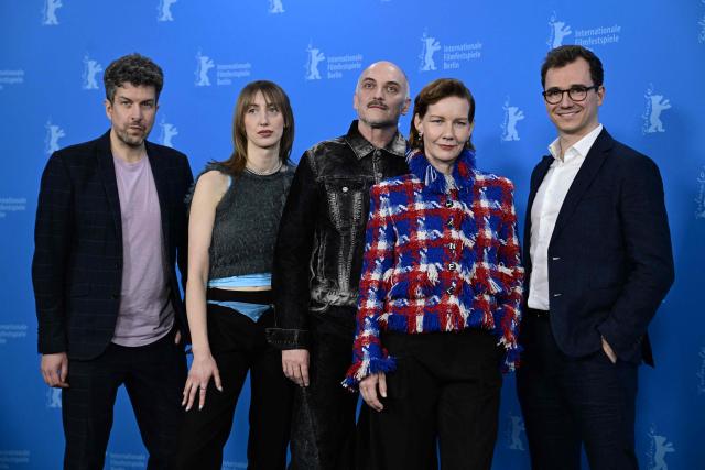 film producer Tobias Walker, German actress Caro Braun, Austrian Director Markus Schleinzer, German actress Sandra Hueller and film producer Johannes Schubert pose during a photo call for the film "Rose" presented in competition at the 76th Berlinale, Europe's first major film festival of the year, in Berlin on February 15, 2026. (Photo by John MACDOUGALL / AFP)