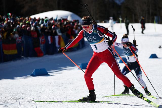 Norway's Maren Kirkeeide (L) and France's Oceane Michelon (R) ski during the women's biathlon 10km pursuit event during the Milano Cortina 2026 Winter Olympic Games at the Anterselva Biathlon Arena (Sudtirol Arena) in Anterselva (Val Pusteria) on February 15, 2026. (Photo by FRANCK FIFE / AFP)