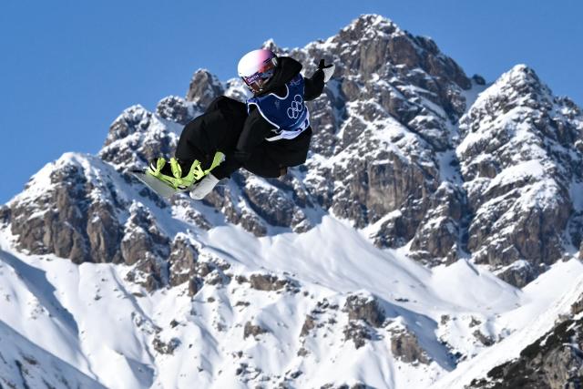 New Zealand's Lucia Georgalli competes in the snowboard women's slopestyle qualification run 1 during the Milano Cortina 2026 Winter Olympic Games at Livigno Snow Park, in Livigno (Valtellina), on February 15, 2026. (Photo by Jeff PACHOUD / AFP)