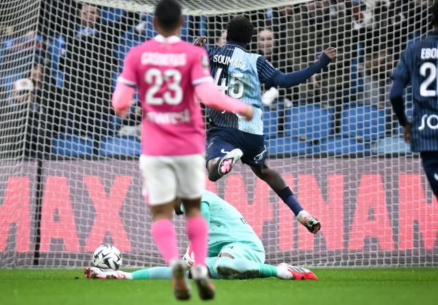 Le Havre's Senegalese forward #45 Issa Soumare scores the first goal during the French L1 football match between Le Havre AC and Toulouse FC at the Stade Oceane in Le Havre, north-western France, on February 15, 2026. (Photo by Lou BENOIST / AFP)