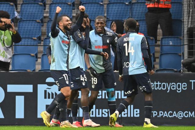 Le Havre players celebrate after scoring the first goal during the French L1 football match between Le Havre AC and Toulouse FC at the Stade Oceane in Le Havre, north-western France, on February 15, 2026. (Photo by Lou BENOIST / AFP)