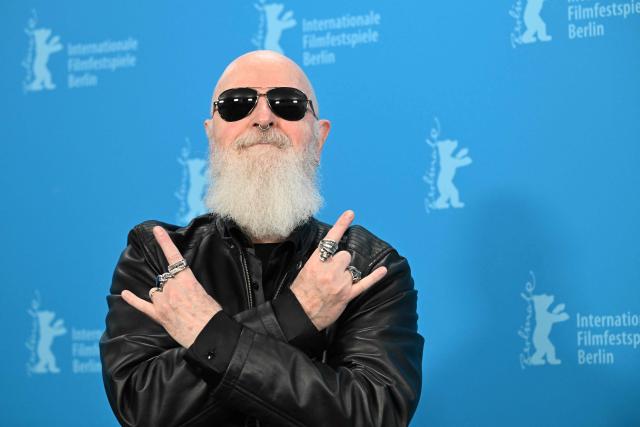 Judas Priest singer and actor Rob Halford poses during a photo call for the film 'The Ballad of Judas Priest' presented in Berlinale Special Gala at the 76th Berlinale, Europe's first major film festival of the year, in Berlin on February 15, 2026. (Photo by RALF HIRSCHBERGER / AFP)