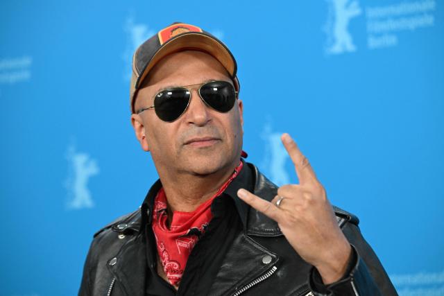Former Rage Against the Machine guitarist and director Tom Morello pose during a photo call for the film 'The Ballad of Judas Priest' presented in Berlinale Special Gala at the 76th Berlinale, Europe's first major film festival of the year, in Berlin on February 15, 2026. (Photo by RALF HIRSCHBERGER / AFP)