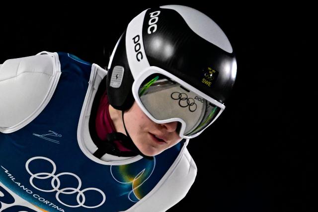 Sweden's Westman Frida jumps during the trial round of the women's large hill individual ski jumping of the Milano Cortina 2026 Winter Olympic Games at Predazzo Ski Jumping Stadium in Predazzo (Val di Fiemme), on February 15, 2026. (Photo by Tobias SCHWARZ / AFP)