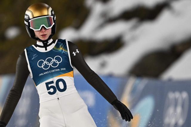 Slovenia's Nika Prevc reacts after jumping during the 1st round of the women's large hill individual ski jumping of the Milano Cortina 2026 Winter Olympic Games at Predazzo Ski Jumping Stadium in Predazzo (Val di Fiemme), on February 15, 2026. (Photo by Javier SORIANO / AFP)