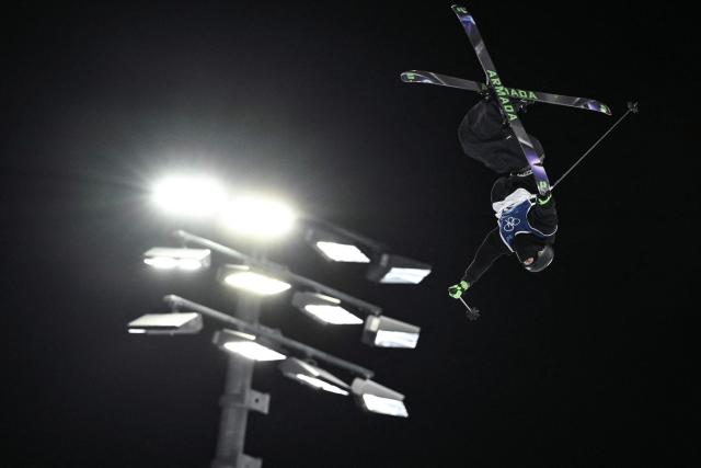 Finland's Kuura Koivisto competes in the freestyle skiing men's freeski big air qualification run 1 during the Milano Cortina 2026 Winter Olympic Games at Livigno Snow Park - Big Air, in Livigno (Valtellina), on February 15, 2026. (Photo by Jeff PACHOUD / AFP)