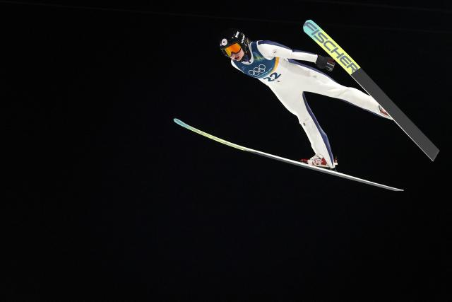 Czech Republic's Anezka Indrackova jumps during the final round of the women's large hill individual ski jumping of the Milano Cortina 2026 Winter Olympic Games at Predazzo Ski Jumping Stadium in Predazzo (Val di Fiemme), on February 15, 2026. (Photo by Anne-Christine POUJOULAT / AFP)