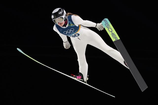 Sweden's Frida Westman jumps during the final round of the women's large hill individual ski jumping of the Milano Cortina 2026 Winter Olympic Games at Predazzo Ski Jumping Stadium in Predazzo (Val di Fiemme), on February 15, 2026. (Photo by Anne-Christine POUJOULAT / AFP)