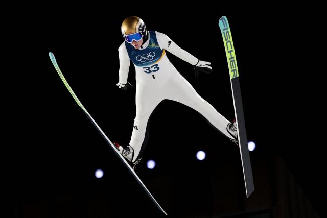 Norway's Silje Opseth jumps during the final round of the women's large hill individual ski jumping of the Milano Cortina 2026 Winter Olympic Games at Predazzo Ski Jumping Stadium in Predazzo (Val di Fiemme), on February 15, 2026. (Photo by Anne-Christine POUJOULAT / AFP)