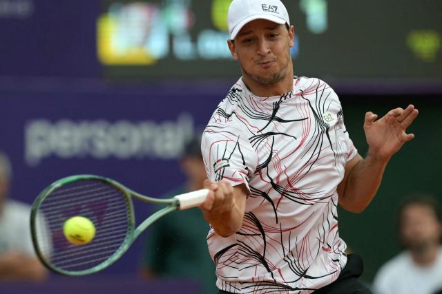 Italy's Luciano Darderi returns the ball to Argentina's Francisco Cerundolo (not in frame) during their ATP 250 Argentina Open final match in Buenos Aires on February 15, 2026. (Photo by JUAN MABROMATA / AFP)