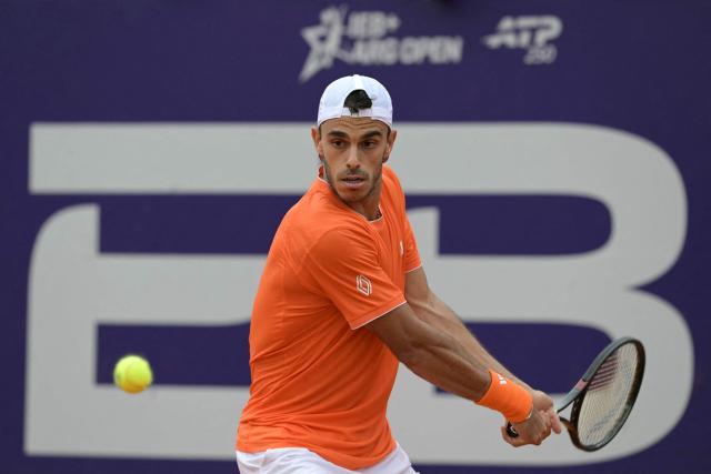 Argentina's Francisco Cerundolo returns the ball to Italy's Luciano Darderi (not in frame) during their ATP 250 Argentina Open final match in Buenos Aires on February 15, 2026. (Photo by JUAN MABROMATA / AFP)