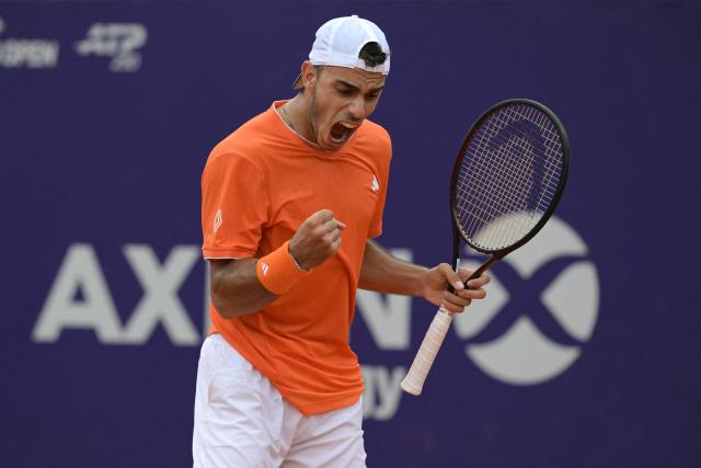 Argentina's Francisco Cerundolo celebrates a point against Italy's Luciano Darderi during their ATP 250 Argentina Open final match in Buenos Aires on February 15, 2026. (Photo by JUAN MABROMATA / AFP)