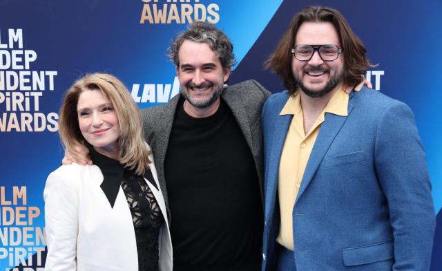 (L-R) US actress Liz Larsen, US filmmaker Jay Duplass and US actor/writer Michael Strassner arrive for the 41st Film Independent Spirit Awards at The Hollywood Palladium in Hollywood, California on February 15, 2026. (Photo by Valerie MACON / AFP)