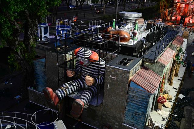 A float of the Academicos de Niteroi samba school is seen before the opening night of the Rio Carnival at the Marques de Sapucai Sambadrome in Rio de Janeiro, Brazil, on February 15, 2026. (Photo by Pablo PORCIUNCULA / AFP)
