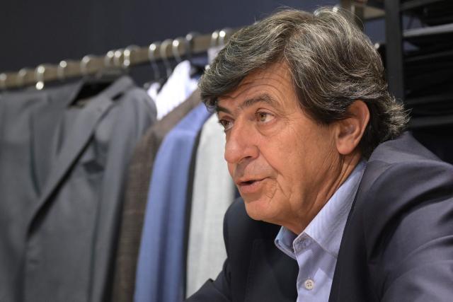 Argentine textile businessman Alejandro Pernas owner of "Confecciones Seman S.A." talks to AFP at his formal wear factory in Buenos Aires on February 10, 2026. The textile industry in Argentina is going through a crisis with falling sales, rising local production costs, and concerns about competition from imports. Since 2023, the textile sector has laid off more than 18,000 people and is operating at one-third of its installed capacity, according to February data from the consulting firm Analytica and the Argentine Textile Industries Federation (FITA). (Photo by JUAN MABROMATA / AFP)