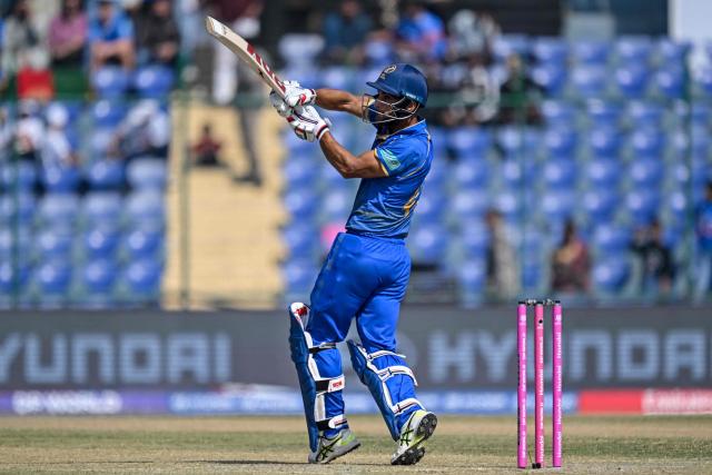 UAE's Sohaib Khan plays a shot during the 2026 ICC Men's T20 Cricket World Cup group stage match between Afghanistan and United Arab Emirates at the Arun Jaitley Stadium in New Delhi on February 16, 2026. (Photo by Arun SANKAR / AFP)