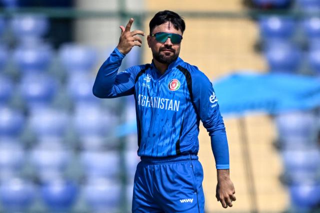 Afghanistan's captain Rashid Khan gestures during the 2026 ICC Men's T20 Cricket World Cup group stage match between Afghanistan and United Arab Emirates at the Arun Jaitley Stadium in New Delhi on February 16, 2026. (Photo by Arun SANKAR / AFP)